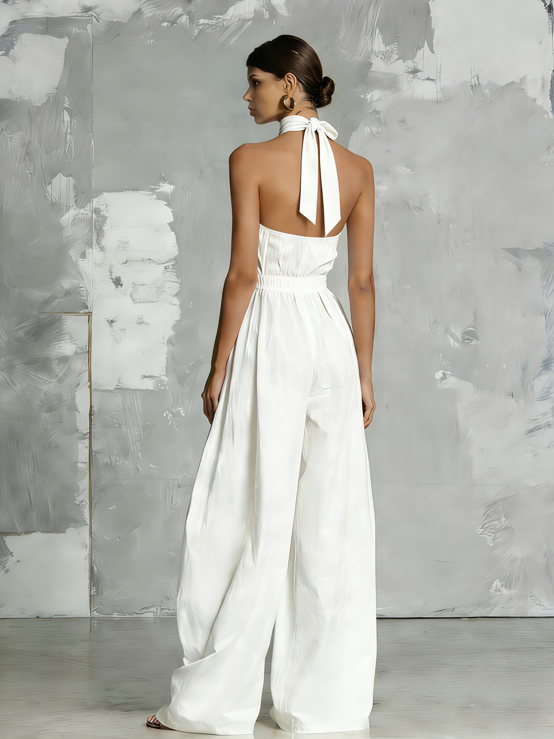Zoltán | Elegant white woven sleeveless halter-neck jumpsuit