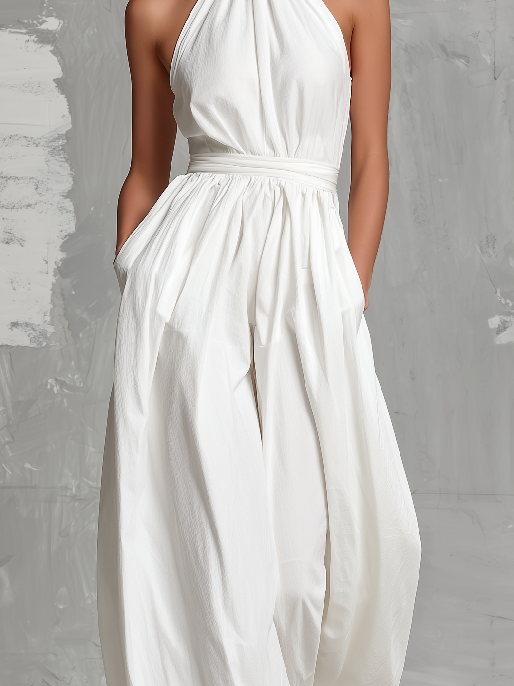 Zoltán | Elegant white woven sleeveless halter-neck jumpsuit